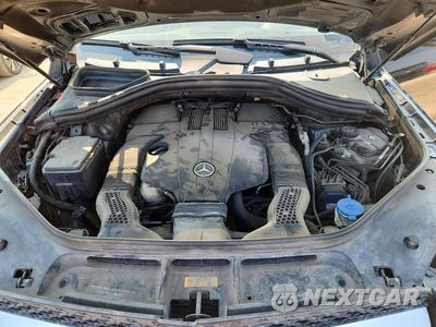Zdjęcie 12 z 13 samochodu: 2015 MERCEDES-BENZ GL 450 4MATIC VIN:4JGDF6EE3FA494439 - miniatura