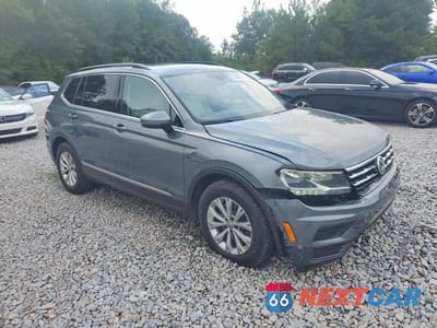 Czwarte zdjęcie samochodu z boku: 2018 VOLKSWAGEN TIGUAN SE VIN:3VV3B7AX3JM169232 - miniatura