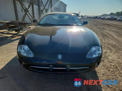Piąte zdjęcie samochodu w środku: 2000 JAGUAR XK8 VIN:SAJJA42C9YNA09427 - miniatura