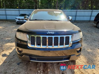 Piąte zdjęcie samochodu w środku: 2013 JEEP GRAND CHEROKEE OVERLAND VIN:1C4RJECG0DC526109 - miniatura
