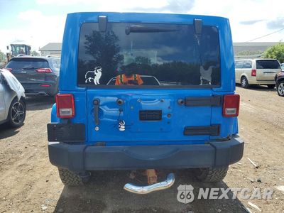Zdjęcie 6 z 13 samochodu: 2011 JEEP WRANGLER UNLIMITED SAHARA VIN:1J4BA5H17BL641416 - miniatura