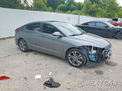 Czwarte zdjęcie samochodu z boku: 2017 HYUNDAI ELANTRA LIMITED VIN:KMHD84LFXHU067383 - miniatura