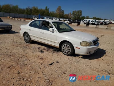 Czwarte zdjęcie samochodu z boku: 2004 KIA OPTIMA LX VIN:KNAGD126145318693 - miniatura