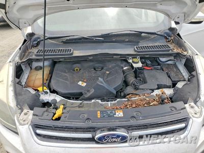 Zdjęcie 12 z 13 samochodu: 2014 FORD ESCAPE TITANIUM VIN:1FMCU9J97EUA92125 - miniatura