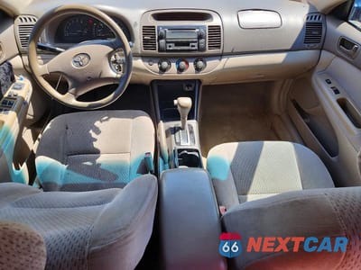 Zdjęcie 8 z 12 samochodu: 2003 TOYOTA CAMRY LE VIN:4T1BE32K03U733930 - miniatura