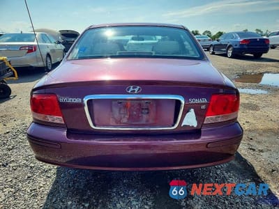 Zdjęcie 6 z 12 samochodu: 2003 HYUNDAI SONATA BASE VIN:KMHWF25H33A855465 - miniatura