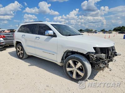 Czwarte zdjęcie samochodu z boku: 2014 JEEP GRAND CHEROKEE OVERLAND VIN:1C4RJFCT7EC355444 - miniatura