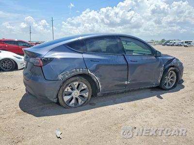 Trzecie zdjęcie samochodu z tyłu: 2023 TESLA MODEL Y VIN:7SAYGDEE1PA174536 - miniatura