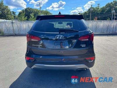 Piąte zdjęcie samochodu w środku: 2017 HYUNDAI SANTA FE SPORT 2.4L VIN:5NMZUDLB0HH035794 - miniatura