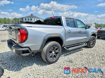 Trzecie zdjęcie samochodu z tyłu: 2023 GMC CANYON ELEVATION VIN:1GTP6BEKXP1144033 - miniatura