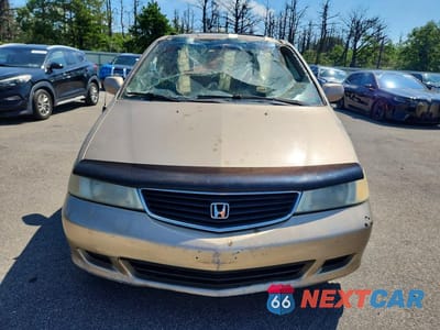 Piąte zdjęcie samochodu w środku: 2001 HONDA ODYSSEY EX VIN:2HKRL18631H610413 - miniatura