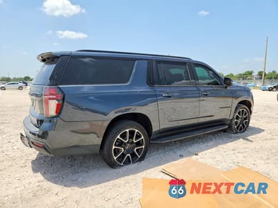 Trzecie zdjęcie samochodu z tyłu: 2021 CHEVROLET SUBURBAN C1500 RST VIN:1GNSCEKD7MR216787 - miniatura