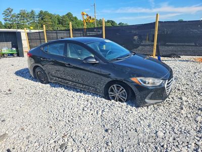Czwarte zdjęcie samochodu z boku: 2017 HYUNDAI ELANTRA SE VIN:5NPD84LF7HH140417 - miniatura
