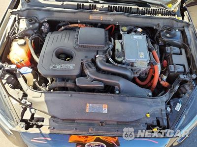Zdjęcie 11 z 12 samochodu: 2013 FORD FUSION SE PHEV VIN:3FA6P0PU7DR386801 - miniatura