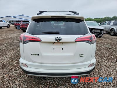 Zdjęcie 6 z 14 samochodu: 2016 TOYOTA RAV4 XLE VIN:JTMRFREV7GD197105 - miniatura