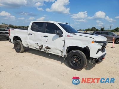 Czwarte zdjęcie samochodu z boku: 2024 CHEVROLET SILVERADO K1500 LT TRAIL BOSS VIN:3GCUDFED7RG315102 - miniatura