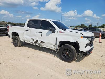 Czwarte zdjęcie samochodu z boku: 2024 CHEVROLET SILVERADO K1500 LT TRAIL BOSS VIN:3GCUDFED7RG315102 - miniatura