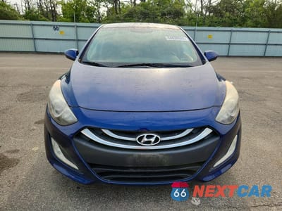 Piąte zdjęcie samochodu w środku: 2013 HYUNDAI ELANTRA GT BASE VIN:KMHD35LE6DU078452 - miniatura