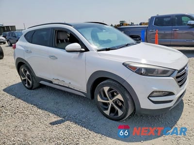 Czwarte zdjęcie samochodu z boku: 2018 HYUNDAI TUCSON LIMITED VIN:KM8J33A26JU763787 - miniatura