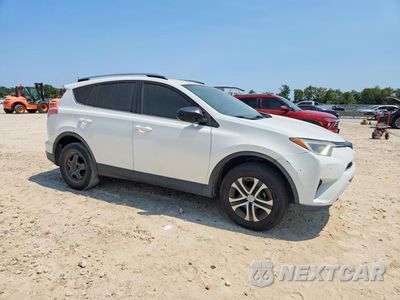 Czwarte zdjęcie samochodu z boku: 2017 TOYOTA RAV4 LE VIN:JTMZFREV5HJ136094 - miniatura
