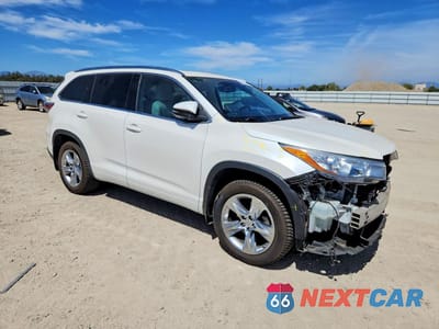Czwarte zdjęcie samochodu z boku: 2014 TOYOTA HIGHLANDER LIMITED PLATINUM VIN:5TDDKRFH2ES027881 - miniatura