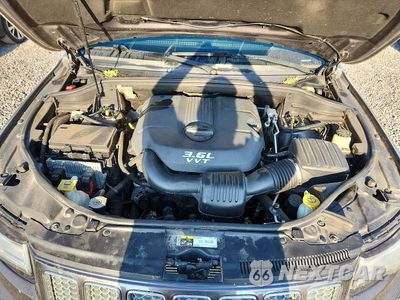Zdjęcie 12 z 13 samochodu: 2014 JEEP GRAND CHEROKEE OVERLAND VIN:1C4RJFCG1EC119097 - miniatura