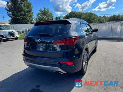 Trzecie zdjęcie samochodu z tyłu: 2017 HYUNDAI SANTA FE SPORT 2.4L VIN:5NMZUDLB0HH035794 - miniatura
