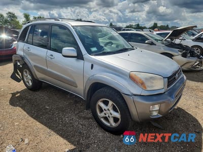 Czwarte zdjęcie samochodu z boku: 2001 TOYOTA RAV4 BASE VIN:JTEHH20V010067780 - miniatura