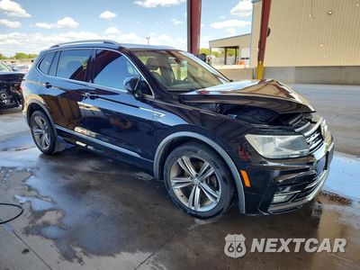 Czwarte zdjęcie samochodu z boku: 2018 VOLKSWAGEN TIGUAN SE VIN:3VV3B7AX7JM196546 - miniatura