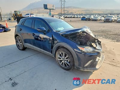 Czwarte zdjęcie samochodu z boku: 2018 MAZDA CX-3 TOURING VIN:JM1DKFC77J1302551 - miniatura