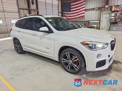 Czwarte zdjęcie samochodu z boku: 2016 BMW X1 XDRIVE28I VIN:WBXHT3C31G5E51331 - miniatura