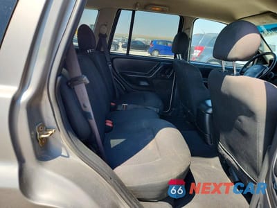 Zdjęcie 11 z 13 samochodu: 2002 JEEP GRAND CHEROKEE LAREDO VIN:1J4GW48N12C183036 - miniatura