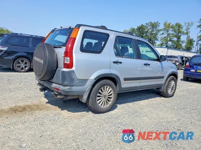 Trzecie zdjęcie samochodu z tyłu: 2002 HONDA CR-V LX VIN:JHLRD68432C009642 - miniatura