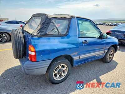 Trzecie zdjęcie samochodu z tyłu: 2001 CHEVROLET TRACKER VIN:2CNBE18C716906066 - miniatura