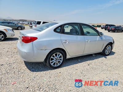 Trzecie zdjęcie samochodu z tyłu: 2010 HYUNDAI ELANTRA BLUE VIN:KMHDU4AD0AU831552 - miniatura