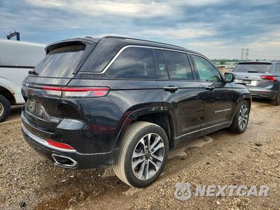 Trzecie zdjęcie samochodu z tyłu: 2022 JEEP GRAND CHEROKEE OVERLAND 4XE VIN:1C4RJYD64N8758661 - miniatura