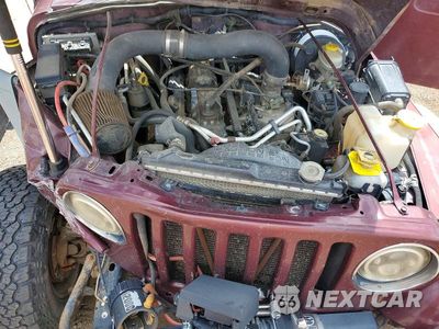 Zdjęcie 12 z 13 samochodu: 2001 JEEP WRANGLER / TJ SPORT VIN:1J4FA49S71P303301 - miniatura