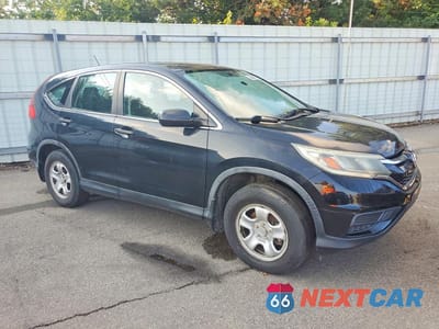 Czwarte zdjęcie samochodu z boku: 2015 HONDA CR-V LX VIN:5J6RM4H38FL038580 - miniatura