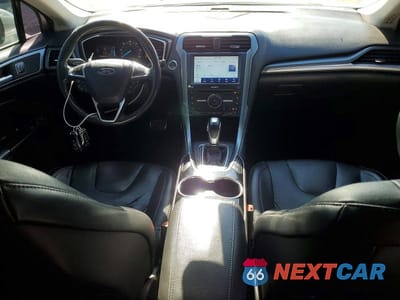 Zdjęcie 8 z 12 samochodu: 2016 FORD FUSION TITANIUM PHEV VIN:3FA6P0SU5GR157013 - miniatura