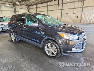 Czwarte zdjęcie samochodu z boku: 2014 FORD ESCAPE SE VIN:1FMCU9GX7EUB73728 - miniatura