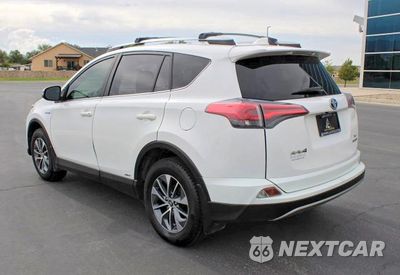 Czwarte zdjęcie samochodu z boku: 2017 TOYOTA RAV4 HYBRID XLE VIN:JTMRJREV3HD104354 - miniatura