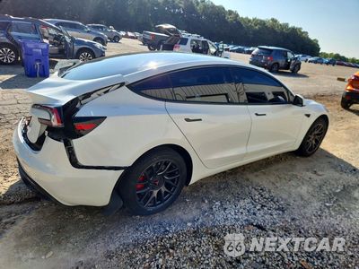 Trzecie zdjęcie samochodu z tyłu: 2024 TESLA MODEL 3 VIN:5YJ3E1EA2RF854928 - miniatura