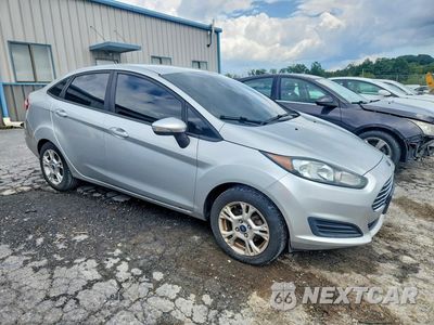 Czwarte zdjęcie samochodu z boku: 2014 FORD FIESTA SE VIN:3FADP4BJ1EM131944 - miniatura