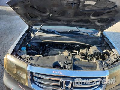 Zdjęcie 12 z 13 samochodu: 2012 HONDA PILOT EXL VIN:5FNYF4H50CB031148 - miniatura