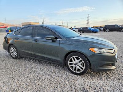 Czwarte zdjęcie samochodu z boku: 2016 FORD FUSION SE VIN:3FA6P0H74GR195267 - miniatura