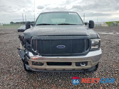 Piąte zdjęcie samochodu w środku: 2000 FORD EXCURSION LIMITED VIN:1FMNU43S2YEC18093 - miniatura