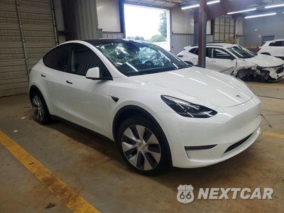 Czwarte zdjęcie samochodu z boku: 2023 TESLA MODEL Y VIN:7SAYGDEE7PF763657 - miniatura