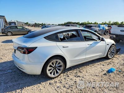Trzecie zdjęcie samochodu z tyłu: 2023 TESLA MODEL 3 VIN:5YJ3E1EA0PF431097 - miniatura
