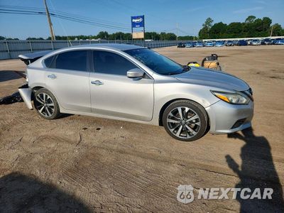 Czwarte zdjęcie samochodu z boku: 2017 NISSAN ALTIMA 2.5 SL VIN:1N4AL3AP9HC173511 - miniatura