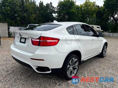 Czwarte zdjęcie samochodu z boku: 2014 BMW X6 XDRIVE50I VIN:5UXFG8C52EL592985 - miniatura